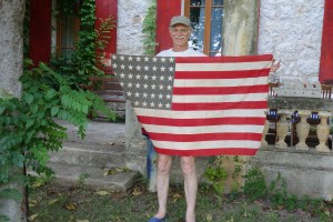 Dominique with his grandfather's flag.